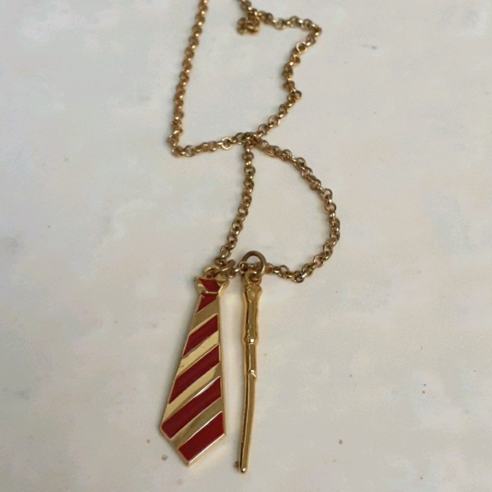 Gryffindor neck tie and wand necklace